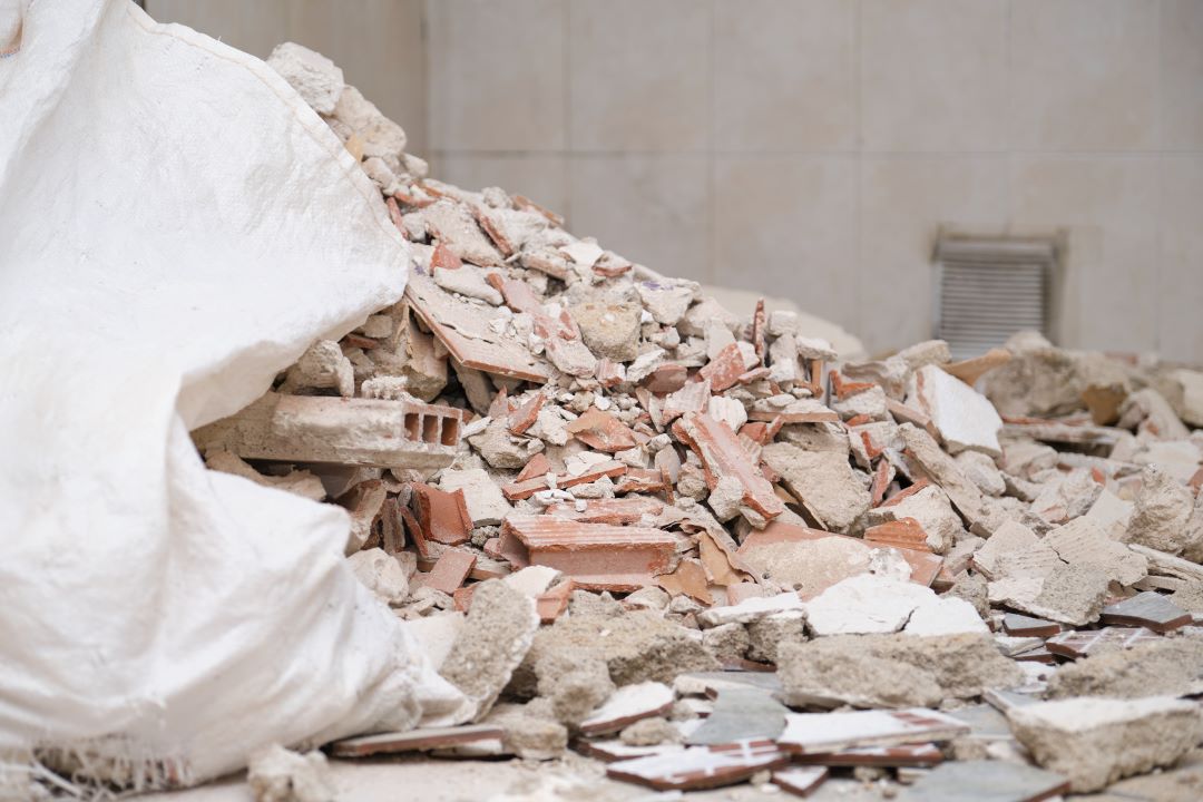 reduce waste in construction, concrete and brick debris from demolition