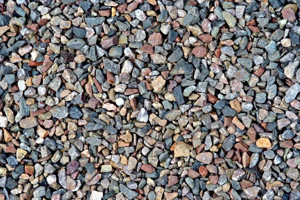 unwashed stones, decorative gravel for landscaping or construction use.
